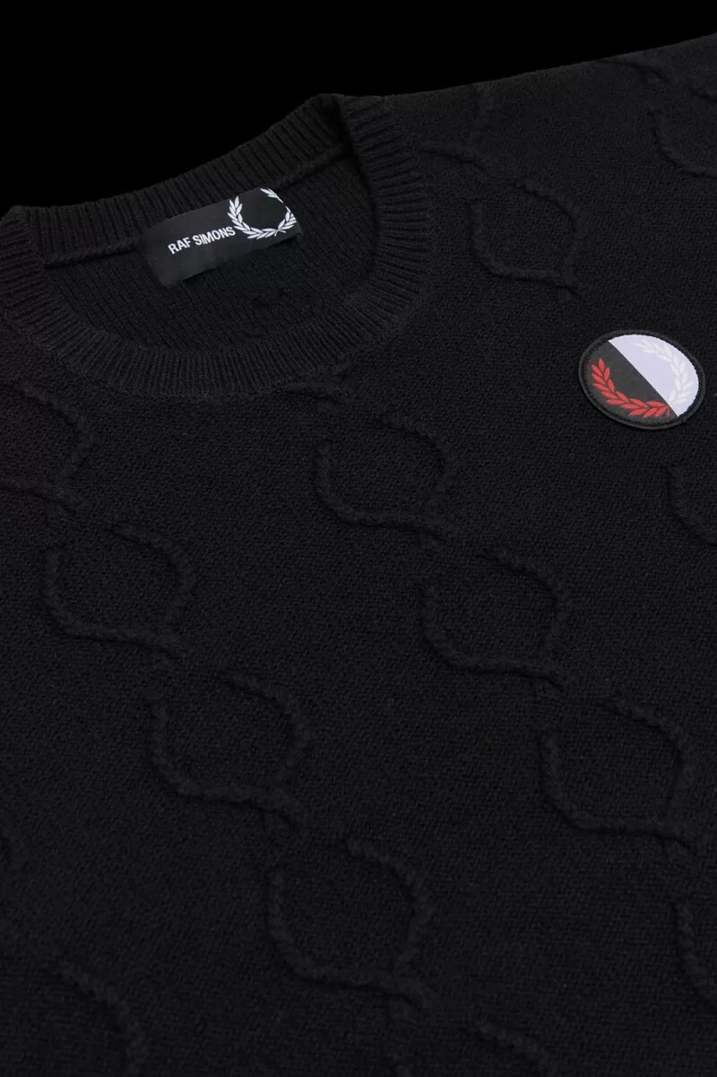 suéter extragrande fred perry con corona de laurel para hombre color negro